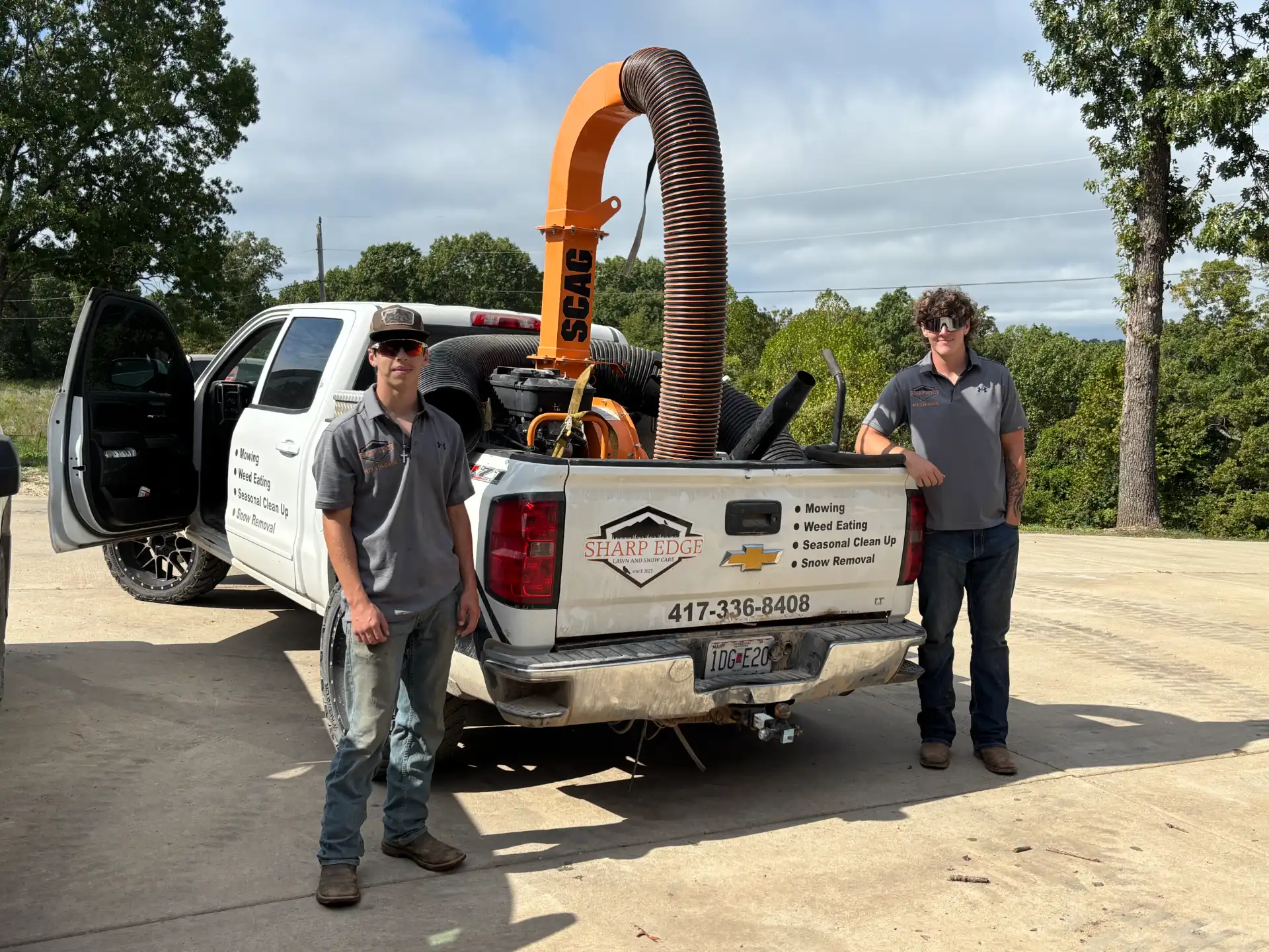 Sharp Edge crew with truck
